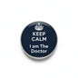 Round dark blue enamel pin with crown, 'KEEP CALM' and 'I am The Doctor' text, silver rim
