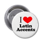 Round pinback button with white face, black lettering, and red heart graphic