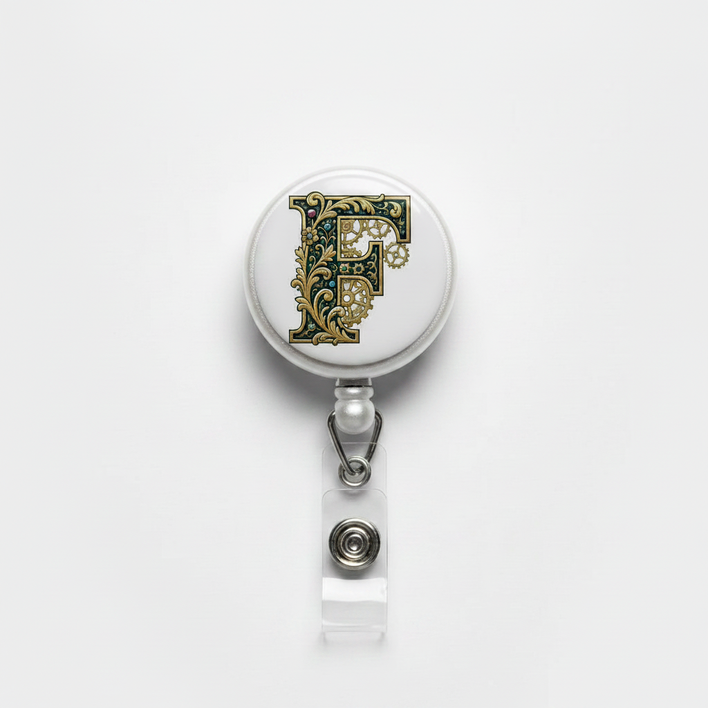 Retractable badge reel with ornate F felt face and clear badge holder clip