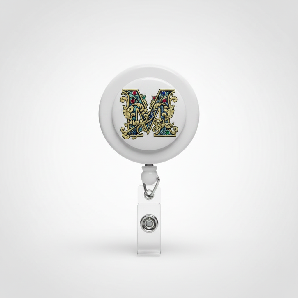 Round retractable badge reel featuring letter M, silver clip and clear badge holder