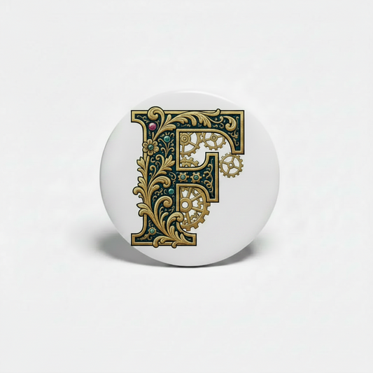 Circular badge reel featuring ornate letter F felt design