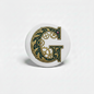 Retractable badge reel, close-up white case with gear-pattern letter G design
