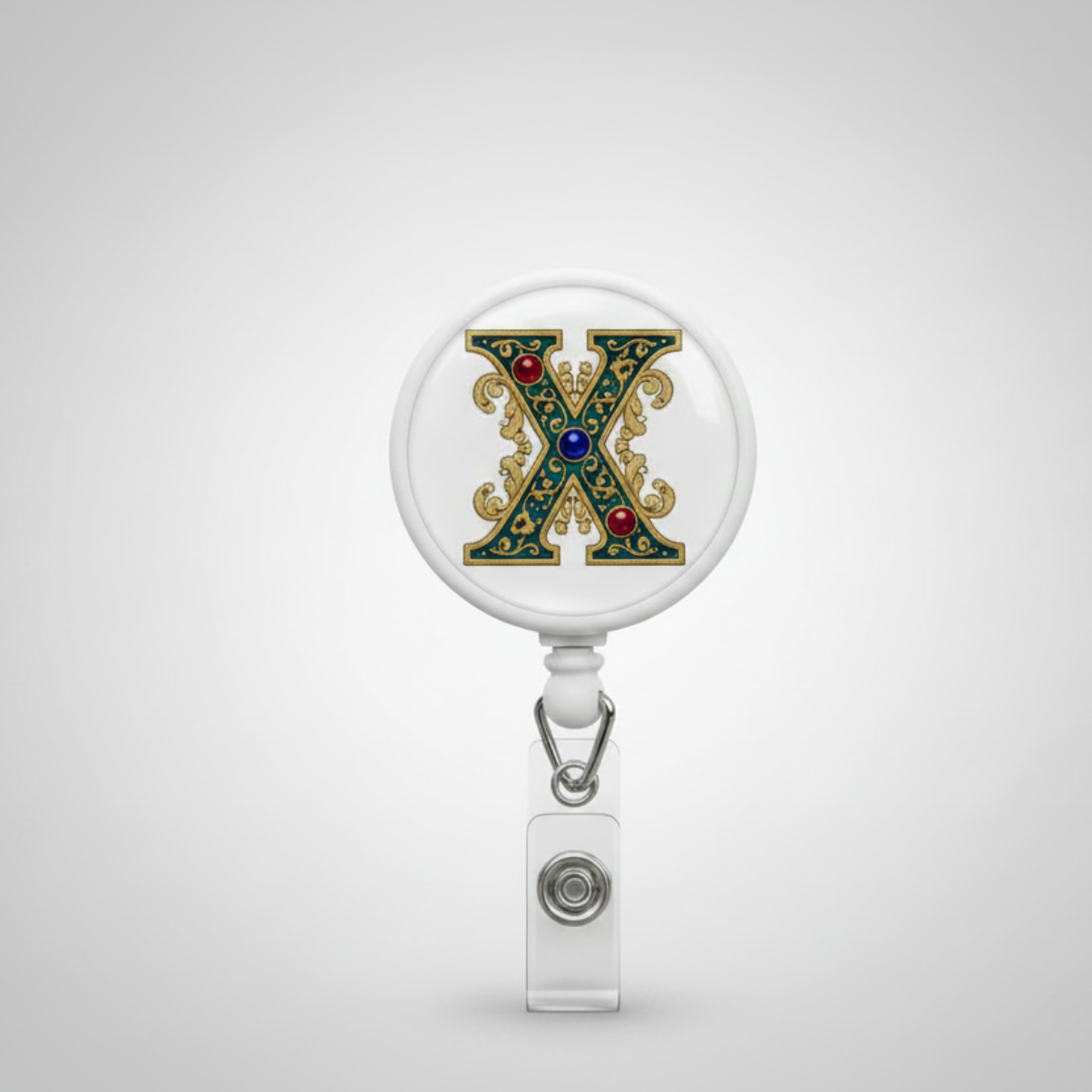 Retractable badge reel with round “X” charm and metal retractable clip