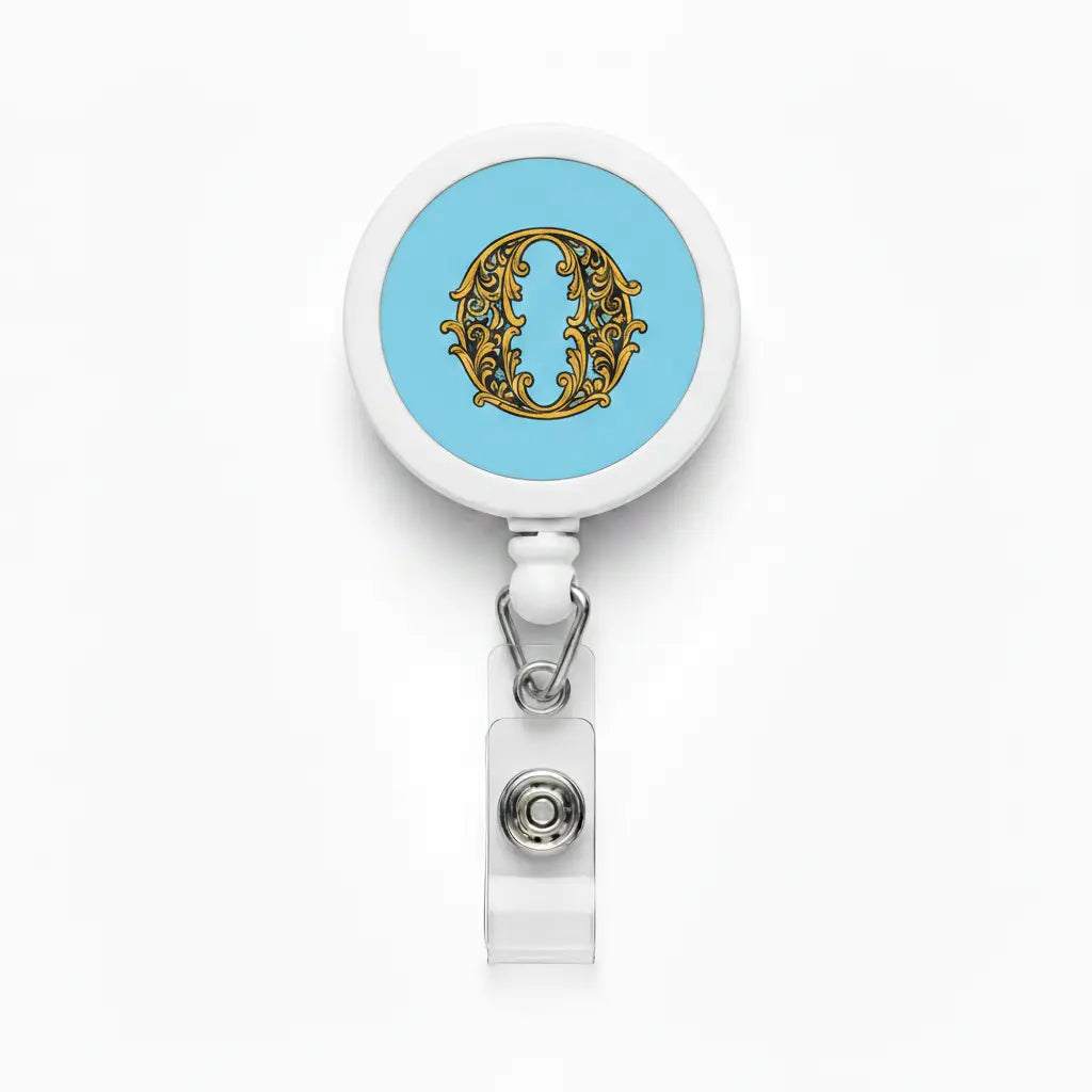 Retractable badge reel with round case, blue face and decorative letter O, chrome clip