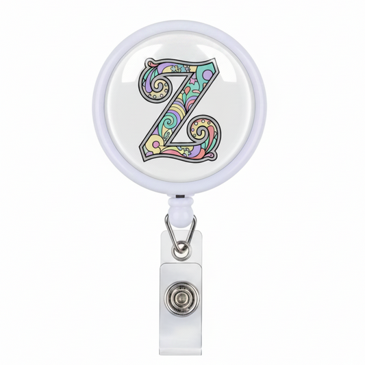 Retractable badge holder with colorful letter 'Z' design on a white background