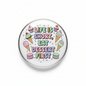 Round pinback button with colorful cupcakes and 'EAT DESSERT FIRST' text