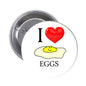 I Love Eggs pinback button with red heart and smiling egg, 'EGGS'
