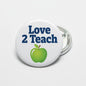 Love 2 Teach green apple pinback button with metal clasp, round white design