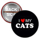 Black pinback button: 'I ♥ MY CATS' in white with red heart