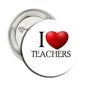 Round metal pinback button with I heart TEACHERS and red heart