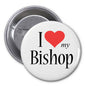 Round pinback button with white face, red heart, and text "I ♥ my Bishop"