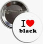 2.25-inch round pinback button with “I ♥ black” text on a white front