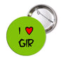 Green I Love GIR pinback button with red heart and black text, visible metal pin back