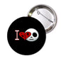 2.25-inch black round pinback button with skull and red heart graphic, safety pin back shown