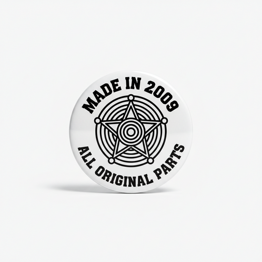 White button with black text Made in 2009 All Original Parts and a star graphic