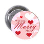 2.25-inch pinback button with “Will you Marry Me?” text and red hearts