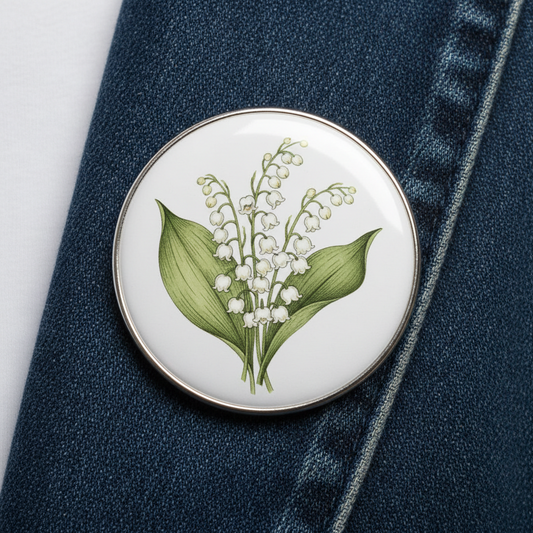 May birthday flower pinback badge with white lily-of-the-valley illustration and silver rim