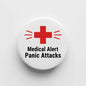 Medical alert panic attacks pinback button with red cross and bold black text on white