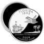 Florida State quarter fridge magnet, circular silver border with airplane, ship, palm, 2004