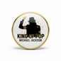 King of Pop tribute pinback button with gold border and black hat design