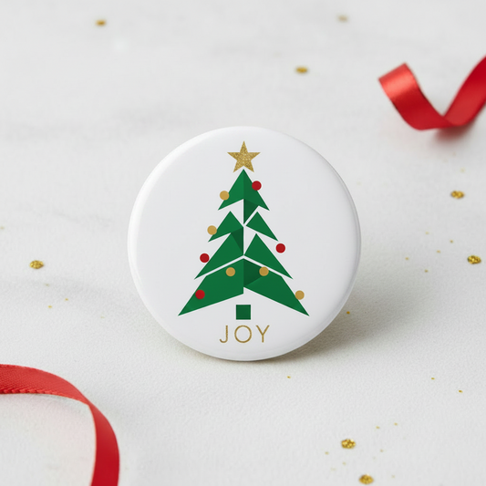 Circular ornament with Christmas tree design and 'JOY' text on a white background