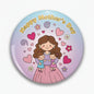 Round 2.25-inch refrigerator magnet with cartoon mother, children, hearts, and flowers