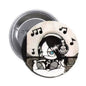 2.25-inch pinback button featuring a cartoon face with blue eyes and music notes