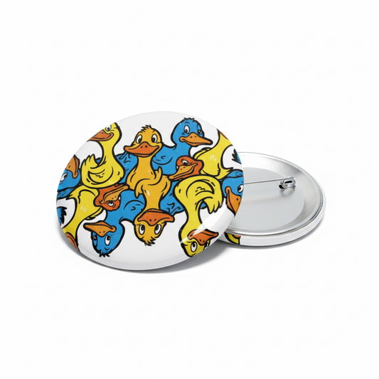 Cartoon duck face pinback button with white and yellow designs and silver back, 2.25-inch