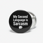 Sarcasm pinback button: black with white text 'My Second Language is Sarcasm'