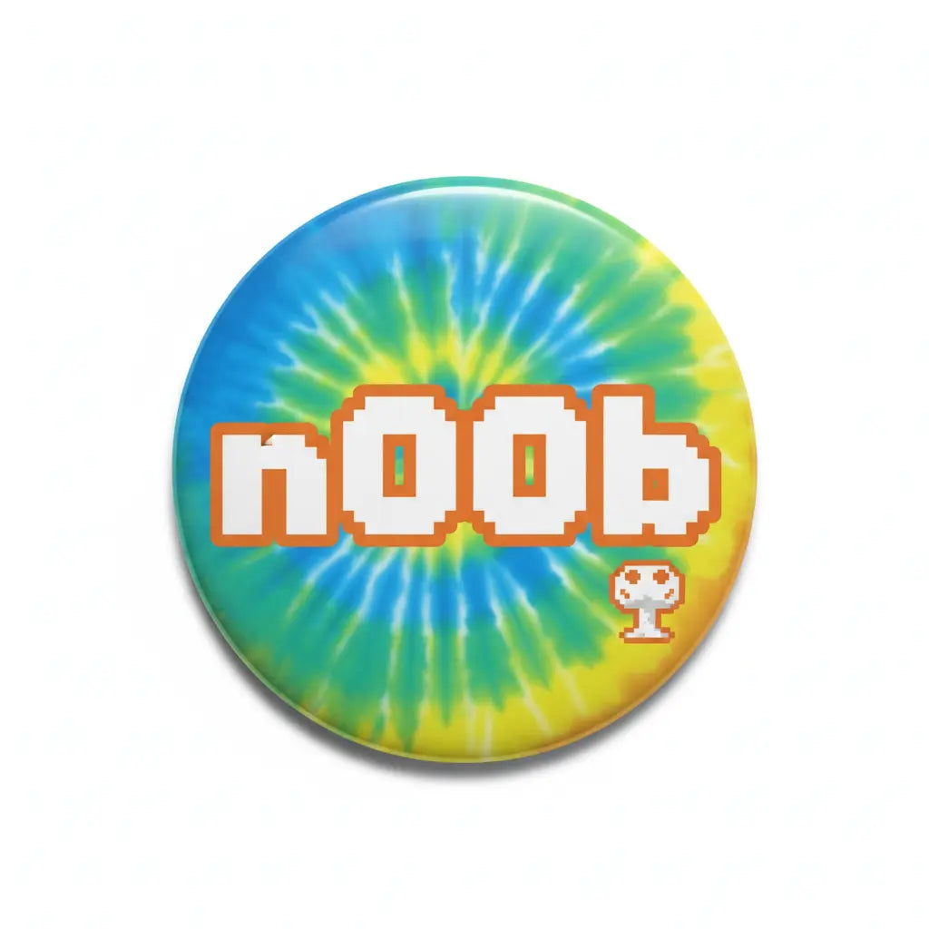 2.25-inch tie-dye pinback button with "n00b" pixel text