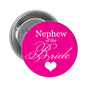Pink round pinback button with “Nephew of the Bride” text and a heart