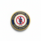 Circular access restricted pin badge with navy text and red prohibition icon