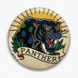 2.25-inch round pinback button with black panther head and PANTHER lettering