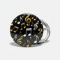 2.25-inch pinback button with black musical notes and gold treble clef design