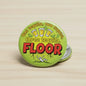 2.25-inch green pinback button, tequila text and red 'FLOOR' design