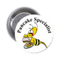 Round cartoon pinback button: yellow bee with pancake, 'Pancake Specialist' text