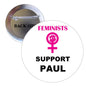 Round pinback button with “Feminists Support Paul” text and feminist symbol