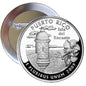 Round silver Puerto Rico coin-style pinback with 2009 lettering and castle landscape