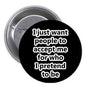 1.25-inch pinback button with black face and white slogan text