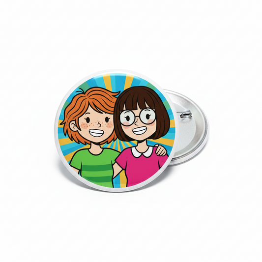 Round cartoon pinback button with two kids faces, silver metal back