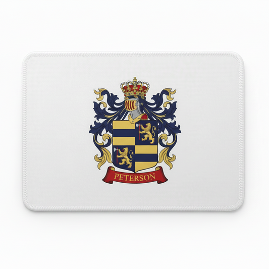 A rectangular white mouse pad with a black border, featuring a detailed family crest with a crown, blue and gold lions, and a red banner reading 'PETERSON'.