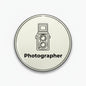 Round pinback button with camera icon and 'Photographer' text, 2.25-inch