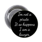 1.25-inch black pinback button with white script quote: 'I'm not a pirate...'