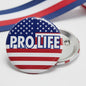 Round pinback button with Pro Life text and blue stars, red and white stripes