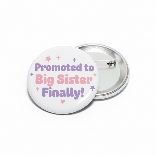 Round lapel pin with pastel text 'Promoted to Big Sister Finally' and heart stars