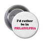 1.25-inch pinback button, white face with black 'I'd rather be in' and red PHILADELPHIA