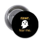Black round pinback button with orange “rawr.” and “fear me.” text plus white ghost icon