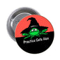 2.25-inch pinback button with green witch and “Practice Safe Hex” text on black/red