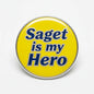 Yellow pinback button with “Saget is my Hero” text