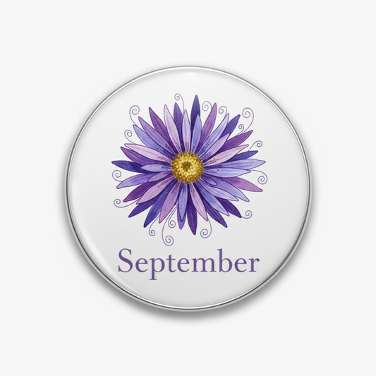 Round silver September flower pinback with purple daisy and gold center